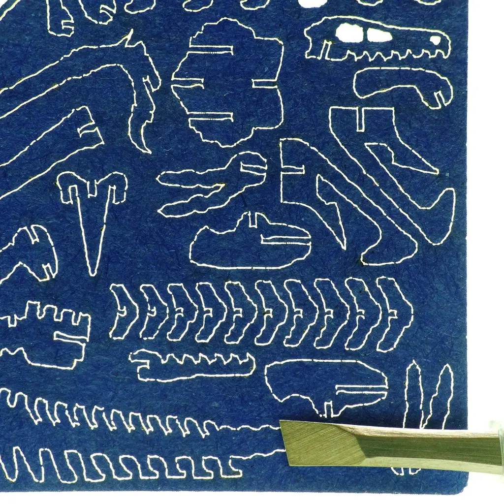 Laser-cut Velociraptor bones
