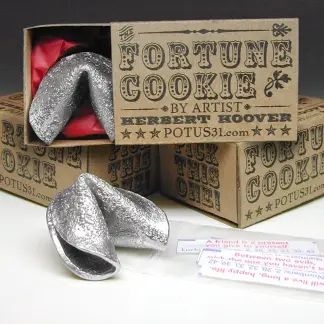 Life-sized Fortune Cookie cast in pewter in a retro styled gift box with multiple fortunes by POTUS31.com
