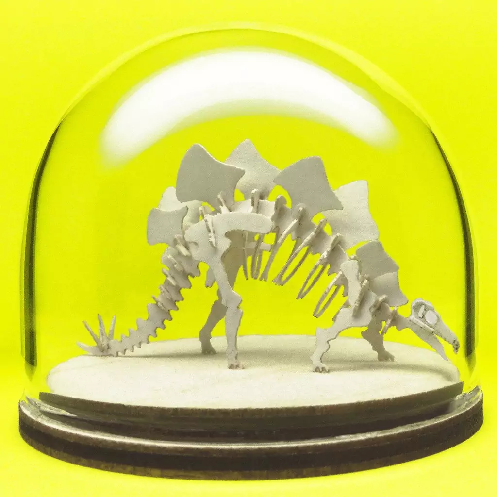 Stegosaurus miniature skeleton model in hand-blown glass display dome by Tinysaur.us